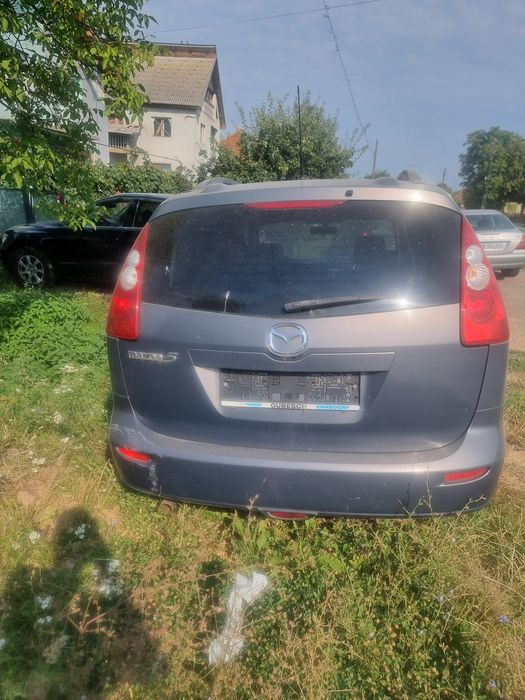 Vând mazda5.  7 locuri