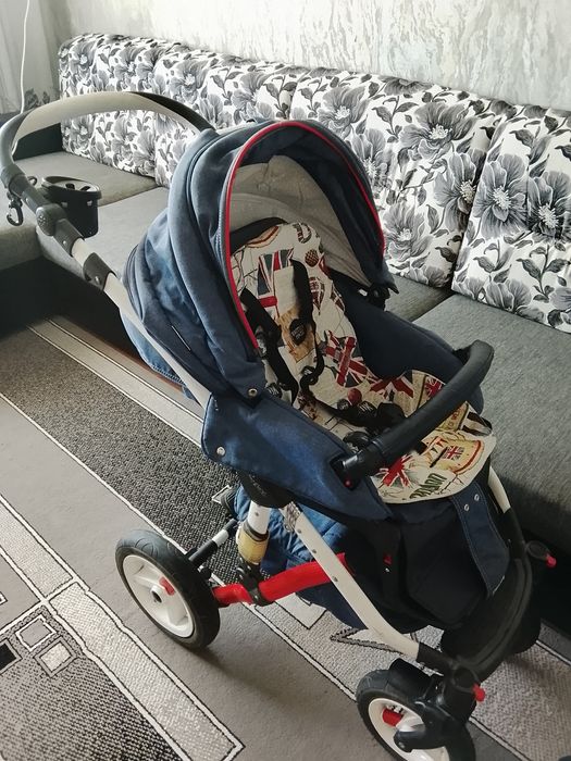 Коляска брэнда ADAMEX три в одном