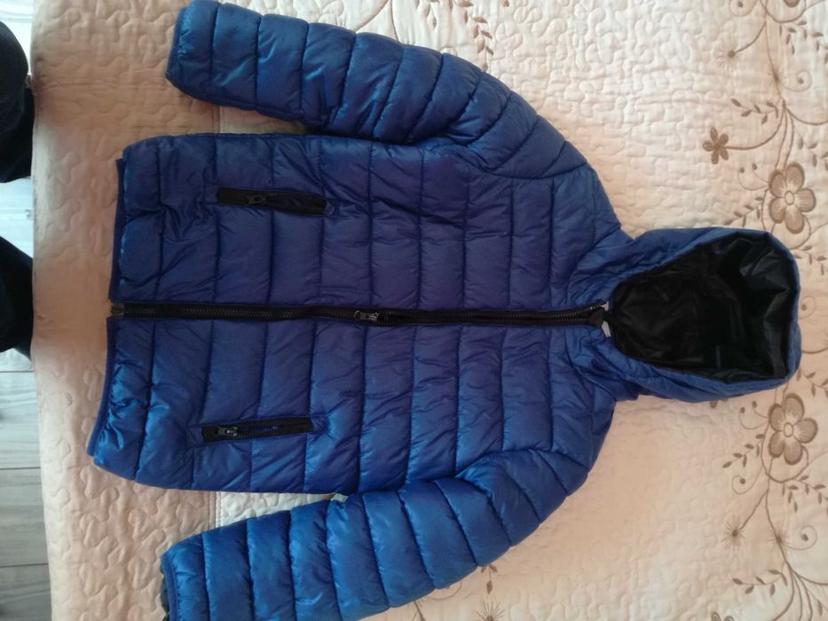 Продавам светло синьо детско зимно яке-DONG