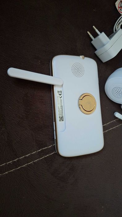 Бебефон Motorola