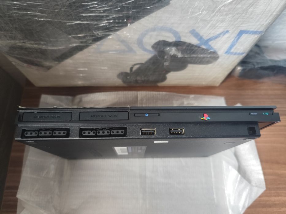 Новая PS2 SLIM..