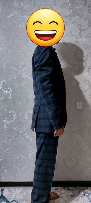 Продам новый костюм