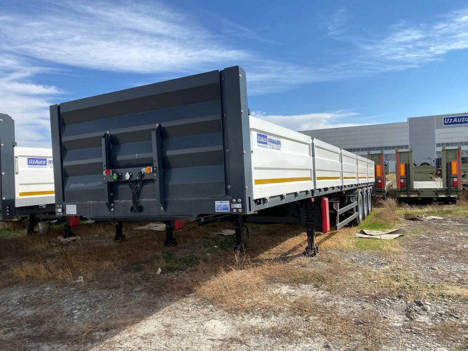 Полуприцеп бортовой контейнеровоз UzAutoTrailer