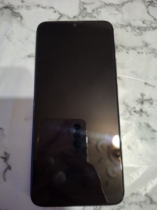 Телефон Моторола Motoe20