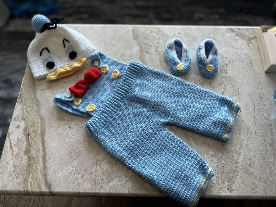 Плетени бебешки дрехи