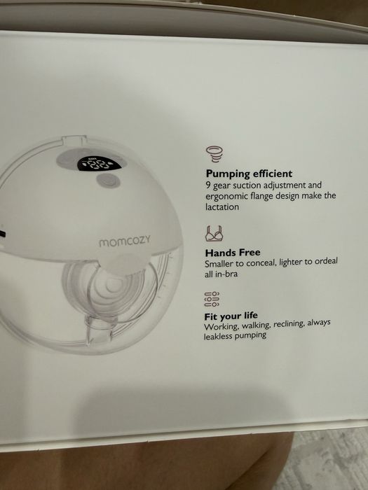 Продам автоматический молокоотсос Momcozy