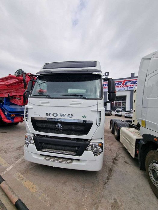 Седельный тягач Sinotruk Howo-T7H 6x4 CNG в НАЛИЧИИ