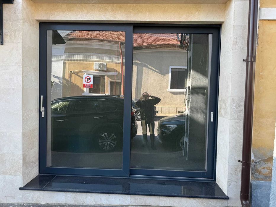 Usa culisanta termopan din aluminiu cu doua deschideri , geam tripan, 2.45m x 2.95m