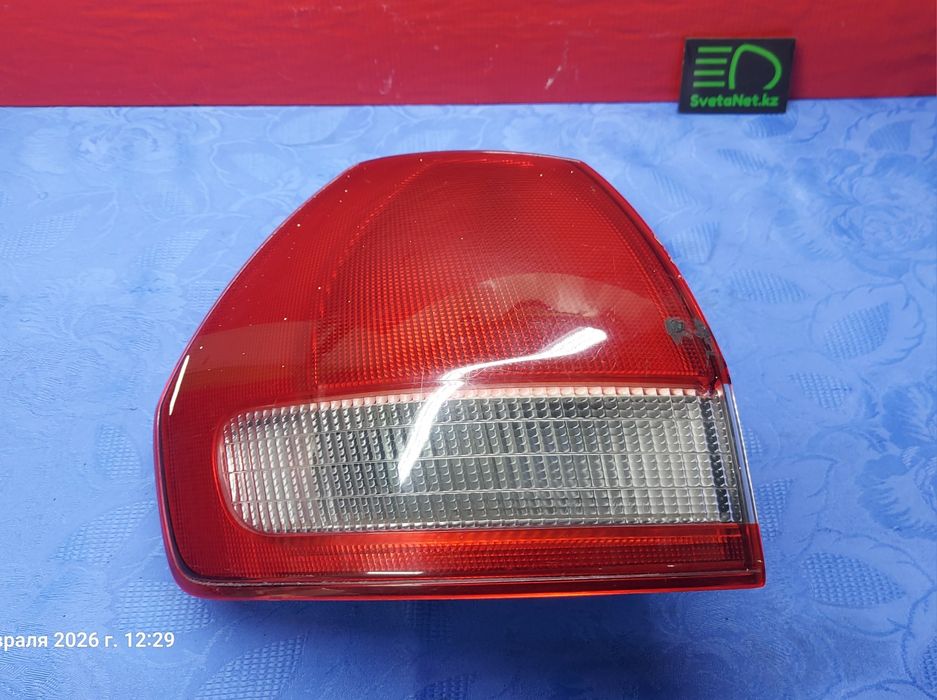 Фонарь Ниссан Вингроуд задний левый стоп на крыло