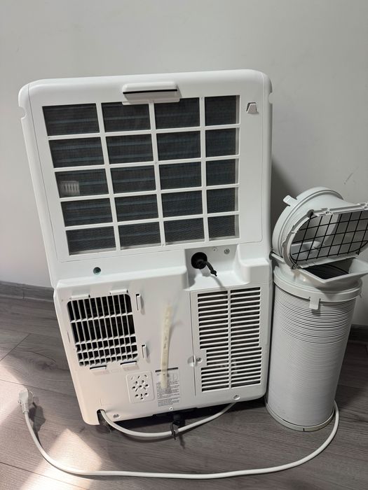 Vând aparat de aer condiționat portabil Whirlpool PACF212HP W – stare foarte bună