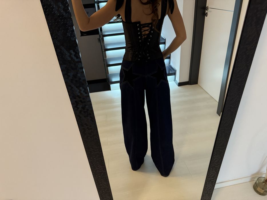 Jeansi stele pe fund