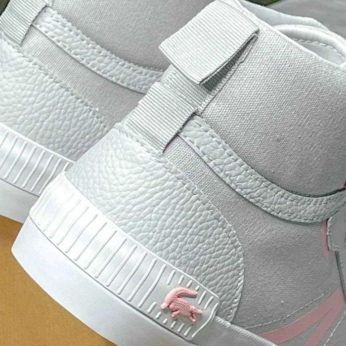 Женские кеды от бренда Lacoste