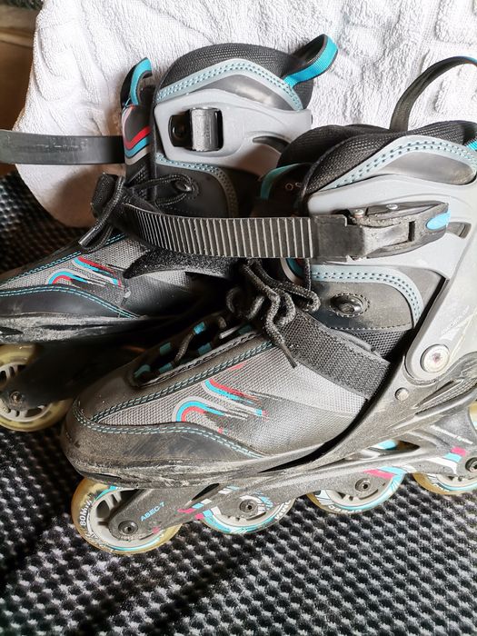 Роликовые коньки