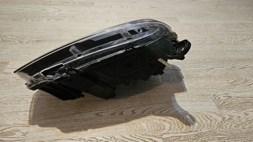 Spira sub volan/Carenaje roti spate/Far stanga Dacia Logan 2 facelift