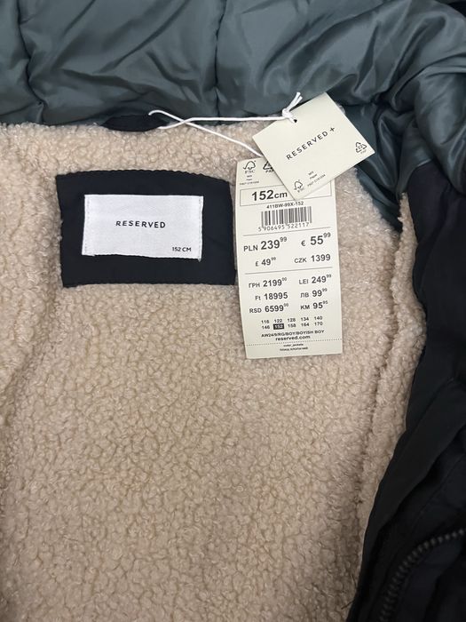 Продам пуховик зимний новый