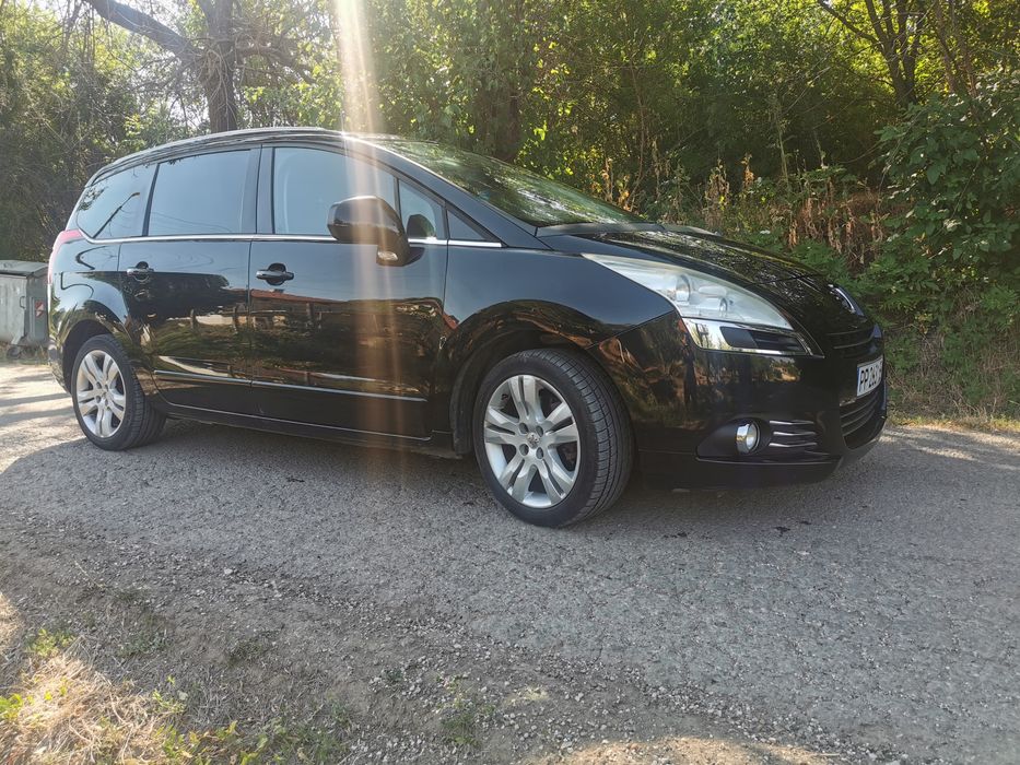 Пежо 5008 2012г.