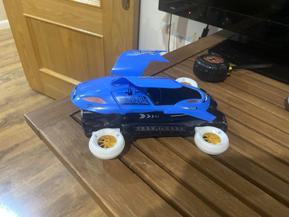 Машинка музыкальная