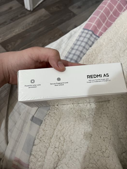 Продам абсолютно новый редми а5