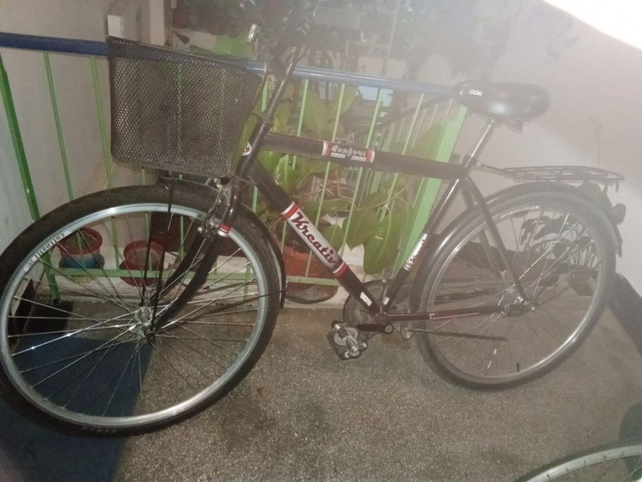 Bicicleta cu roata de rezerva fata