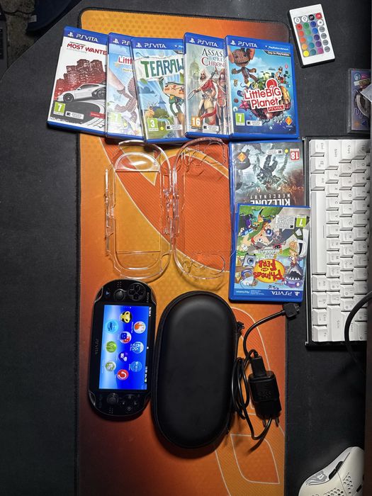 Ps Vita 1104 OLED 128GB, 7 игри, калъф, протектори, зарядно и адаптер за карта памет