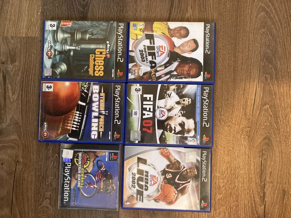 Playstation 2 + volan+ jocuri