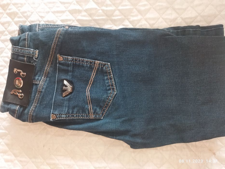 Джинсы для девочки 12 -13 лет