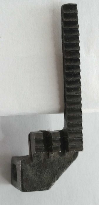 Деталь для оверлока