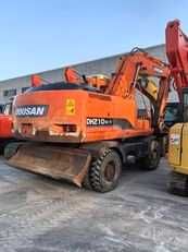 Экскаватор досан 210