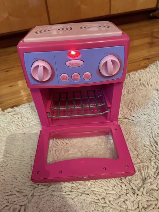 Продаётся игрушка плита с посудкой