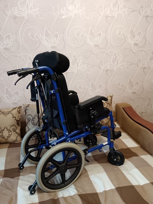 Детская инвалидная коляска