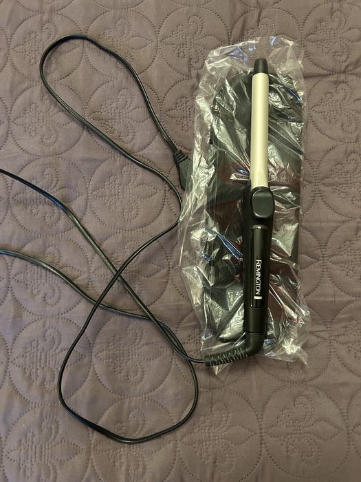 Ondulator Remington cu clapeta