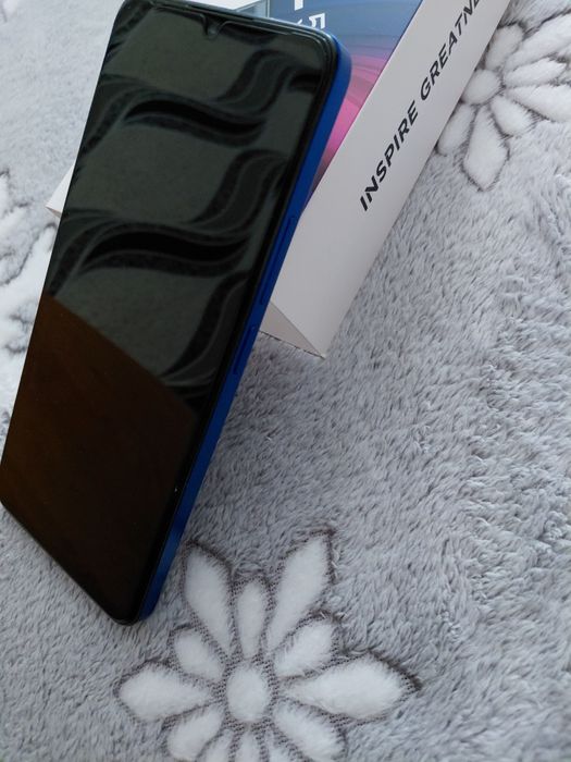 Телефон TCL 509K