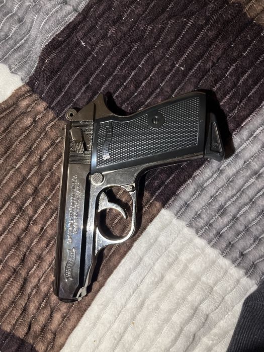 Зажигалка в виде пистолета