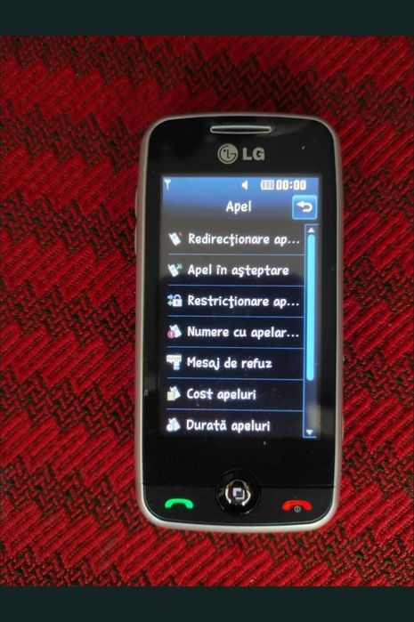 Telefon cu touchscreen și camera video/foto, cu carcasă de aluminiu