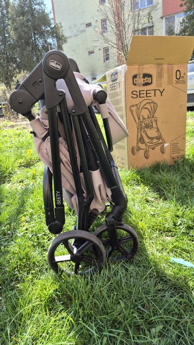Carucior 3 in 1 Chicco Seety culoare crem