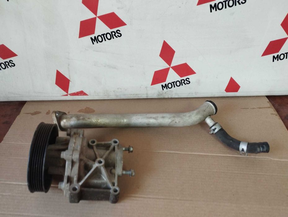 Трубка помпы Митсубиси лансер