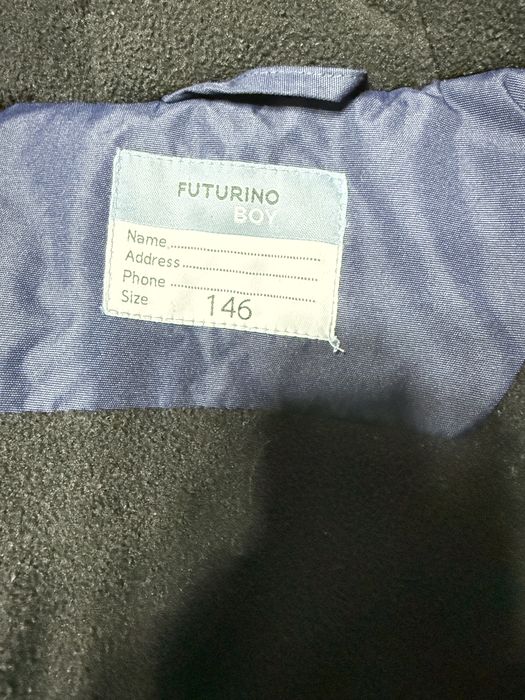 Продается куртка темно-синего цвета б/у (рост 146)