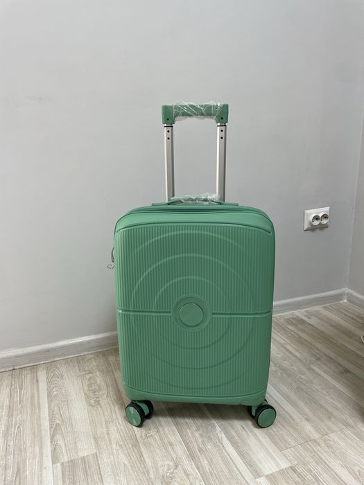 Маленкие новые чемоданы