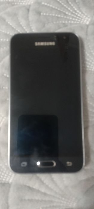 Телефон Самсунг Galaxy J1
