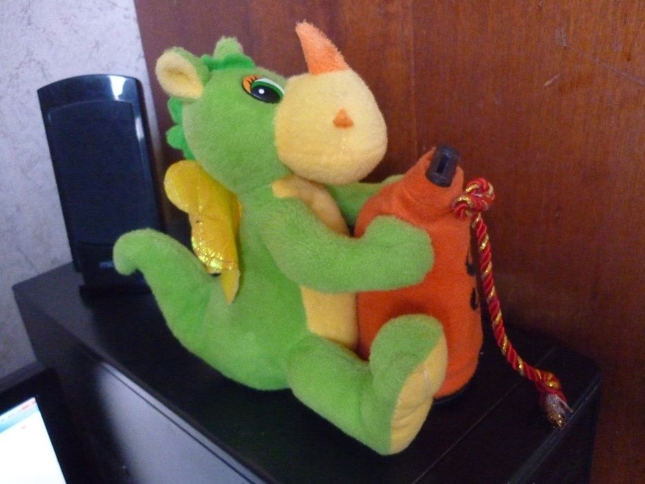 Музыкальная игрушка - копилка.