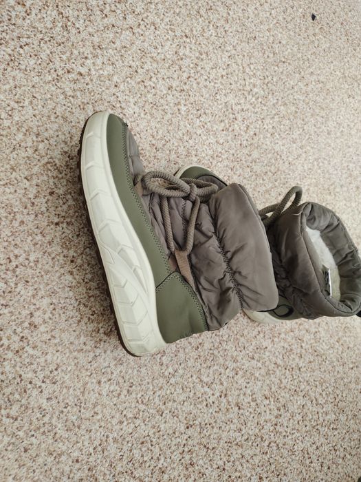 Женьская зимныи обувь