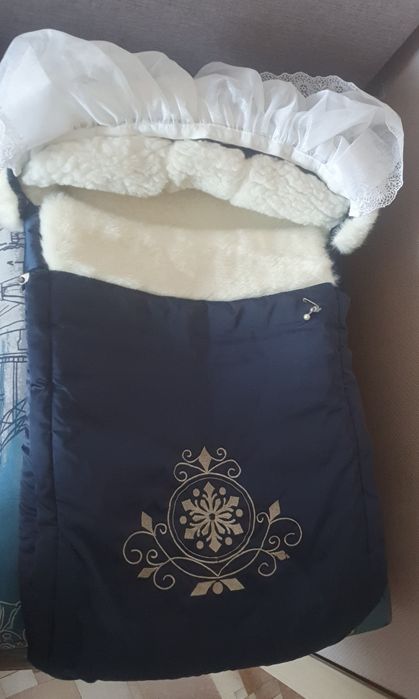 Продам теплый конверт для новорожденного