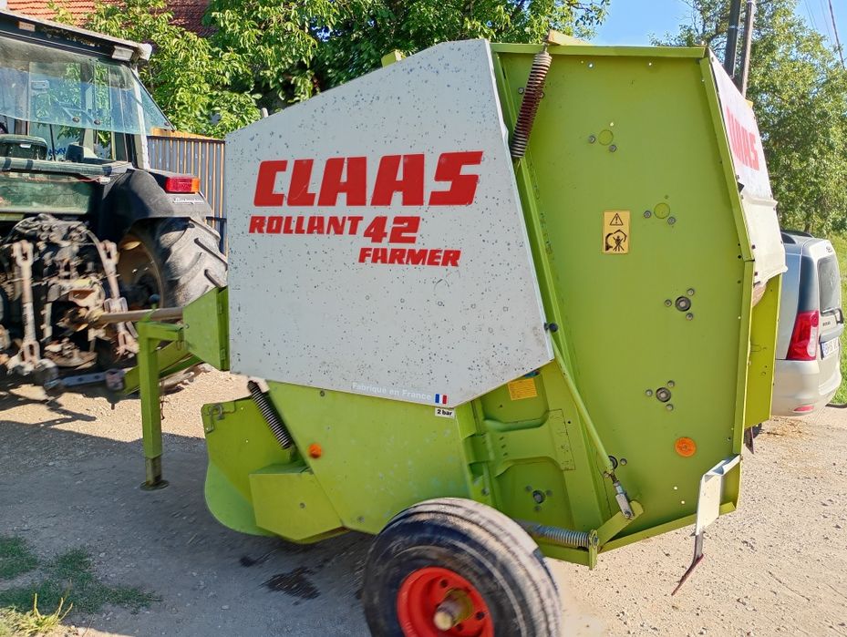Presa baloți rotunzi Claas Rollant 46 Krone plasa