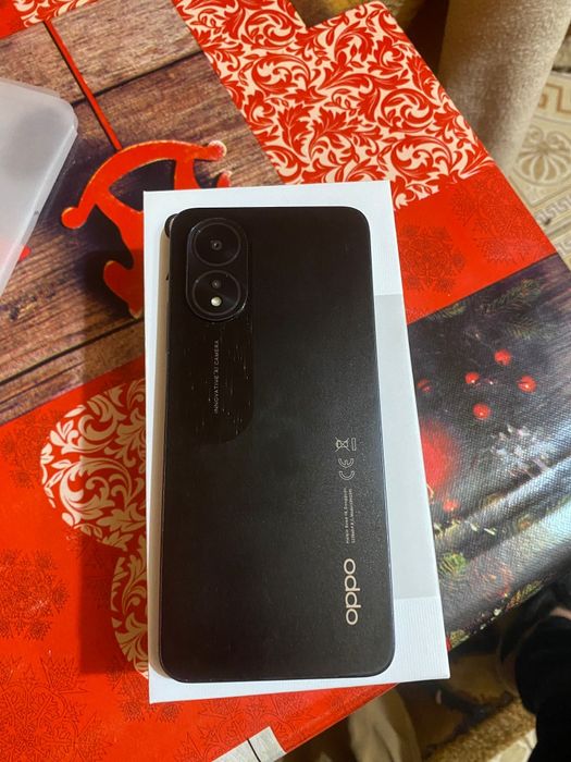 Vând oppo A 18  de 128GB