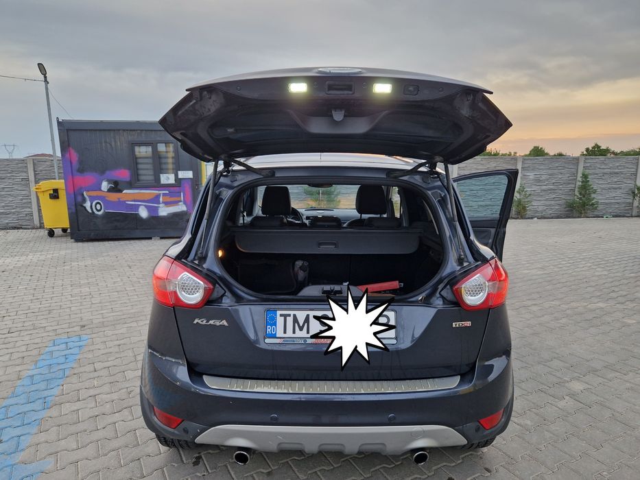 Vand ford kuga din 2010 sau schimb cu VW Passat CC benzina