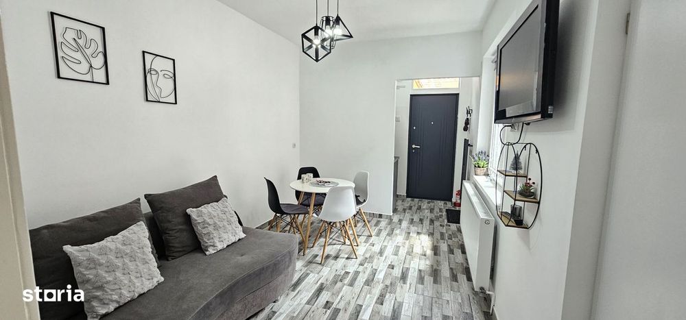 Apartament de vanzare cu terasă și beci, gata de utilizare