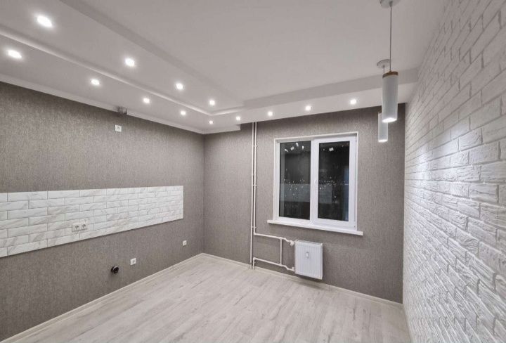 Качественная поклейка обоев.