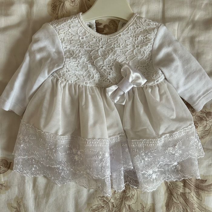 Дрехи за новородено