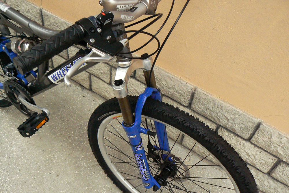 Bicicleta mountain bike de copii full suspensie Wheeler 26