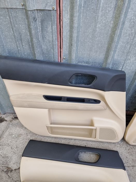 Обшивка двери на Subaru Forester Sg